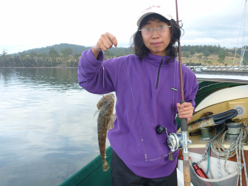 Wing Yee with her first flathead (and Hakura's first one).  Too small to keep.