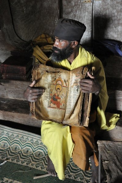A monk, clearly bored with being photographed! - Lake Tana