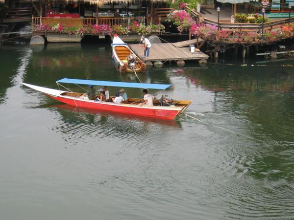 Local longtail boat on the river Kwai