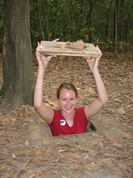 Amy at the Cu Chi tunnels