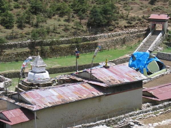 Stupa and crashed helicopter on the way out of Namche
