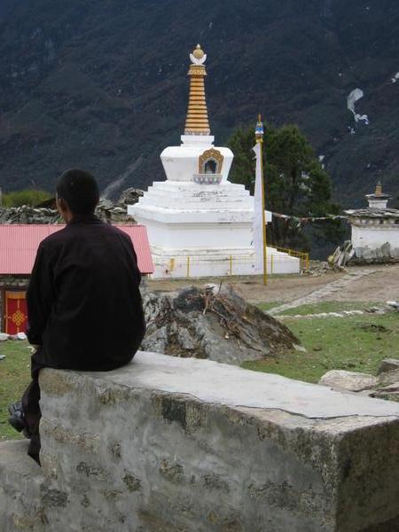 Monk in contemplation outside Tengboche monastery