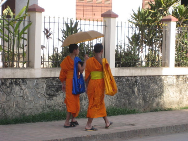 Monks with Umbrellas