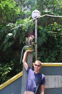 Matt with Monkey outside the Batu Caves, KL