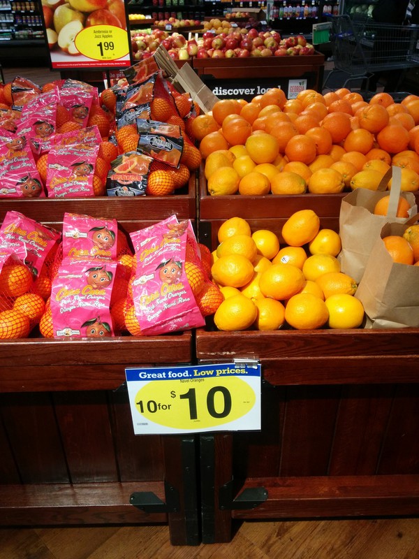 cena sadja. Ena pomaranča 1$