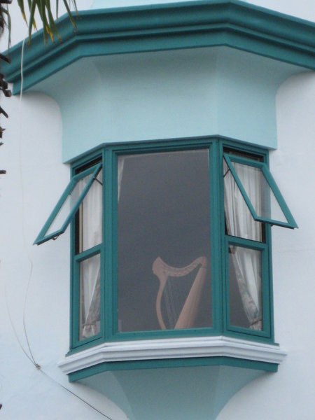 a window with a harp in it