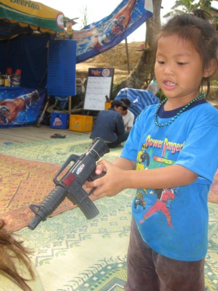 Small child with a gun