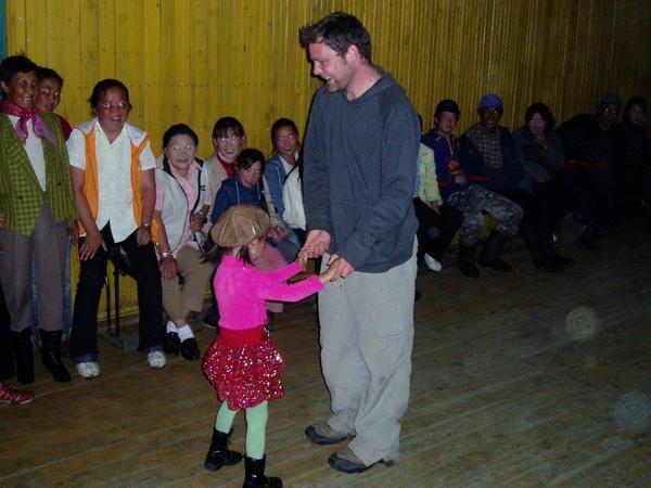 Adam tries it on with the local ladies at the Mongolian 'Disco'