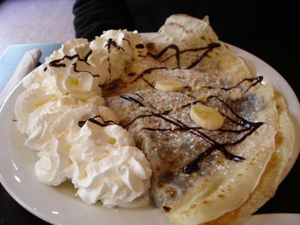 Crepes with chocolate spread and cream