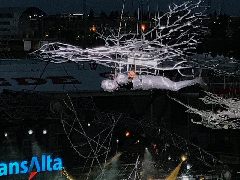  Aerial winged snow people descend to the stage 
