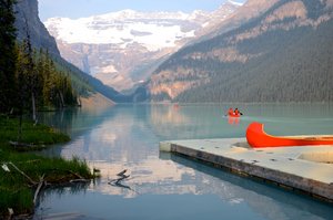 Canoeists on Lake Louise in the morning