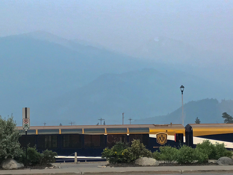 Rocky Mountaineer in for the night under smoky skies