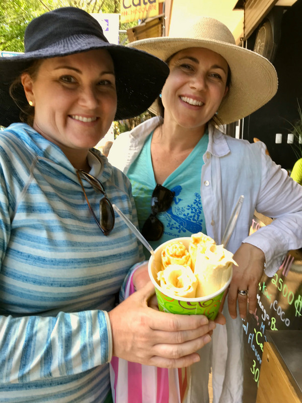 Mandy and Kate eating the delicious mango coconut ice rolls