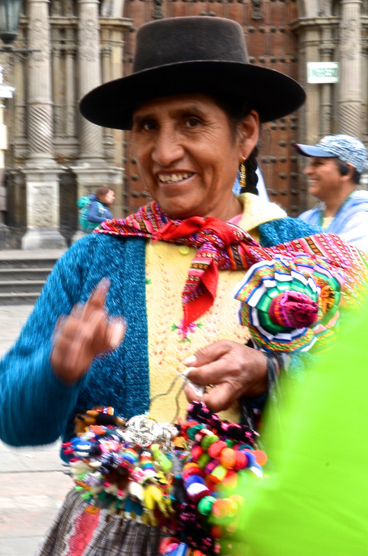 Quechua woman in the courtyard of the Church of San Francisco