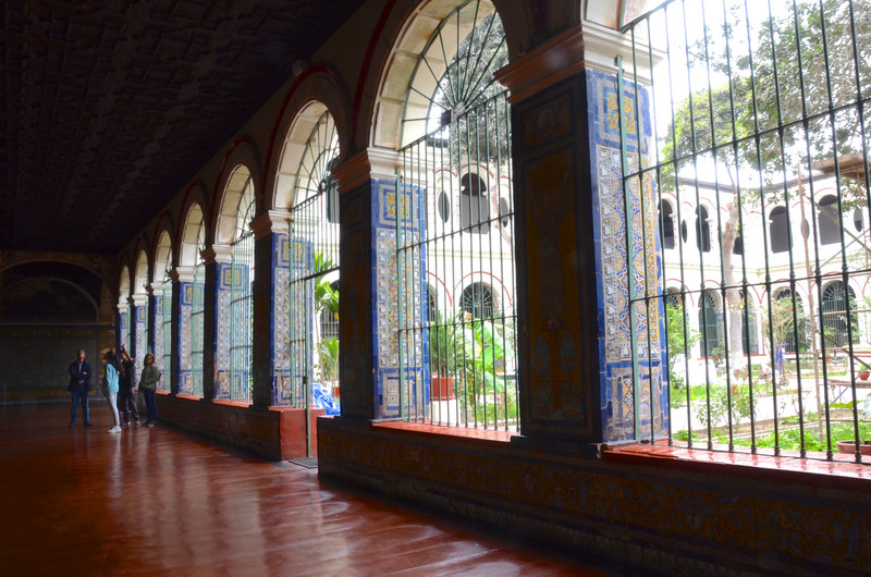 Interior courtyard with beautiful glazed Spanish tiles inside the Church of San Francisco 