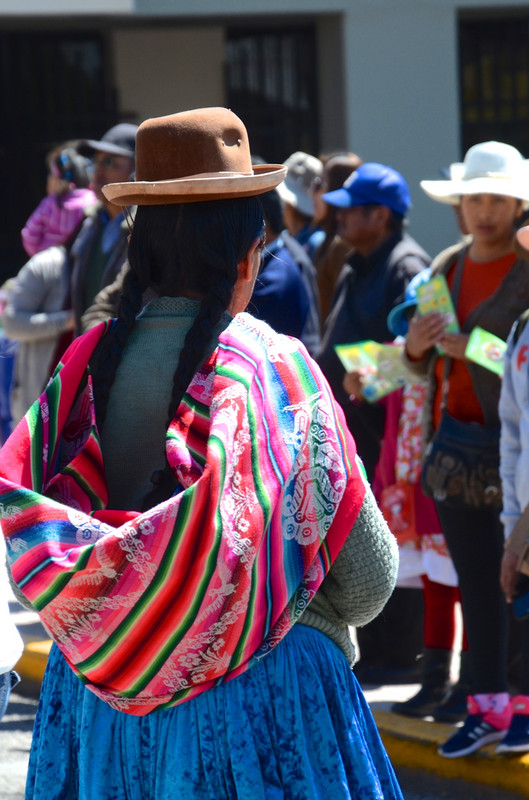 Quechua woman in the traditional bowler hat, Puno