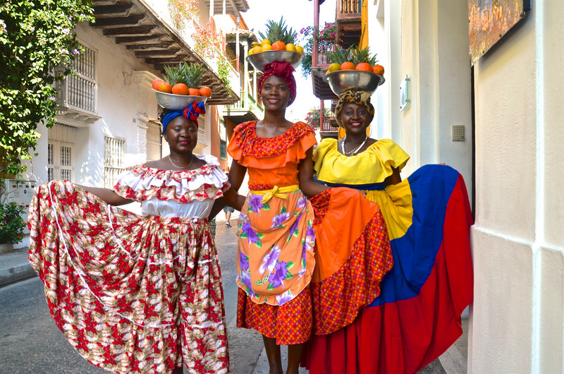 Las Palenqueras or Fruit Basket Ladies sell more than fruit, the priviledge of taking their photos