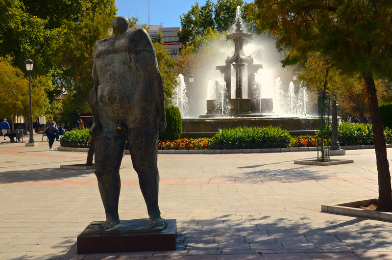 Oft rubbed sculpture in Plaza Nueva, Granada 