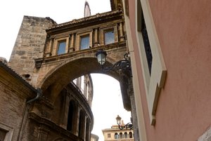 Renaissance arch leads from the Balilica to the Cathedral, Valencia, Spain