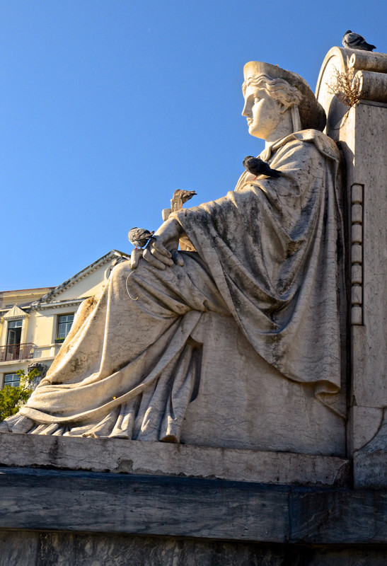 Base of the statue of Pedro IV in Rossio Square one of four marble allegorical female figures representing Justice, Wisdom, Strength and Constraint, qualities attributed to Dom Pedro IV