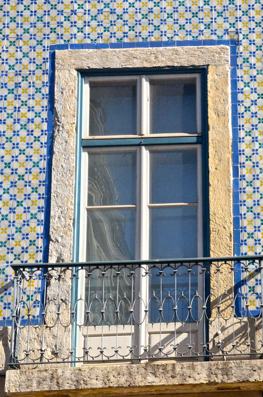 Tiled wall and window in Alfama