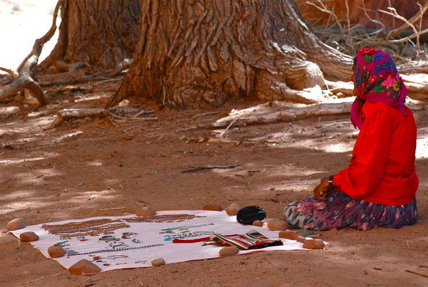 Navajo woman sells jewelry in Canyon de Chelly