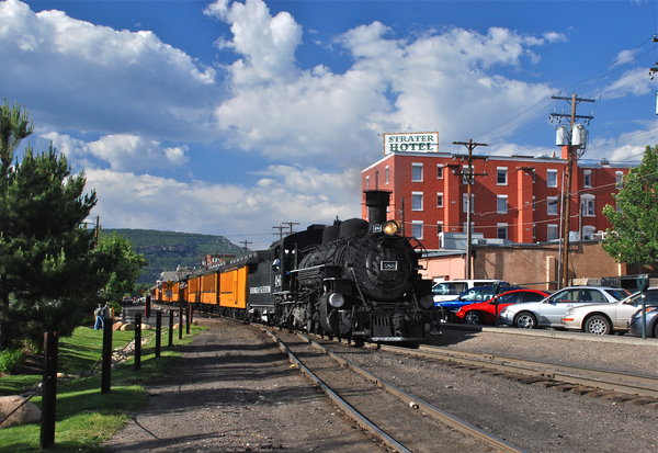 Durango-Silverton Train heading into Durango past the Strater Hotel
