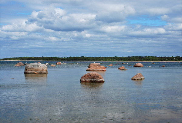 Glacial boulders dot the sea at a cove on Saaremaa Island