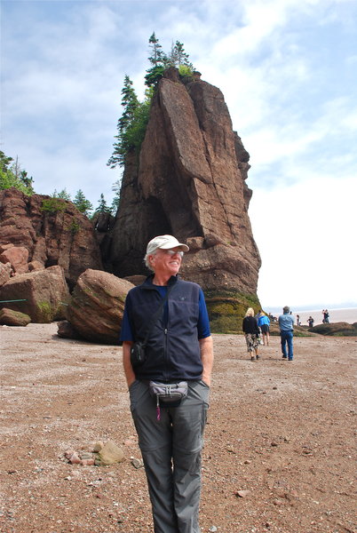 Dave walking the ocean floor with the tide out at Hopewell Rocks