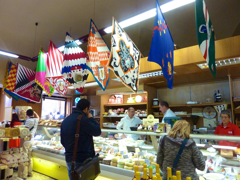 Market for local specialties including cheeses and panforte, Siena, Italy