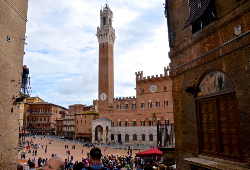 Palazzo Pubblico (town hall) with its gently tilted bell tower, Torre del Mangia, Siena, Italy