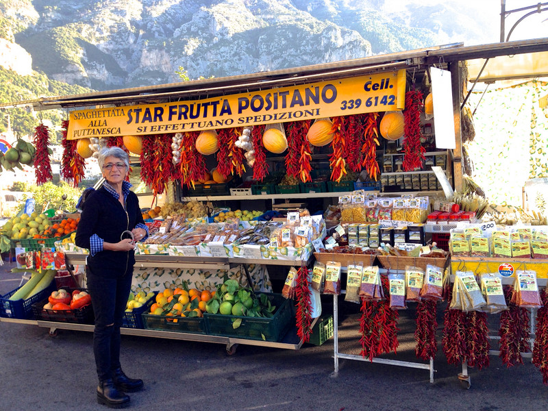 Roadside vendor on the narrow, winding coastal road overlooking Positano, Italy