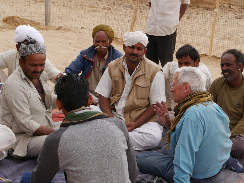 Taking time to chat with mourners in the desert.