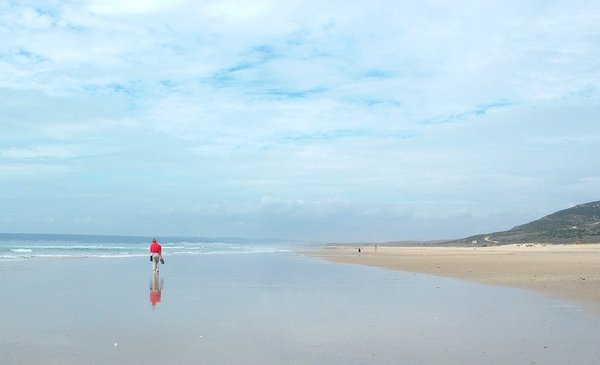 we walked barefoot on deserted beaches