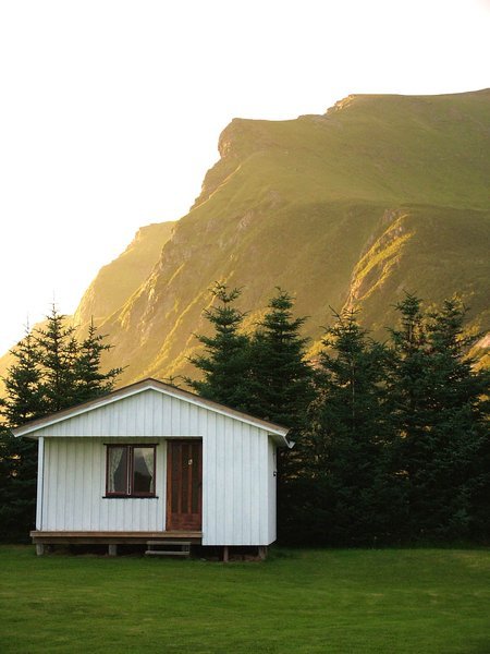 Cabins in Norwegian sunlight