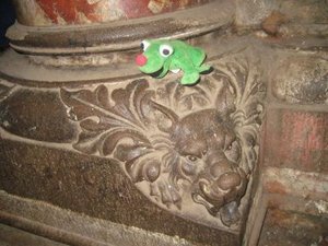 Carving on pillar with frog