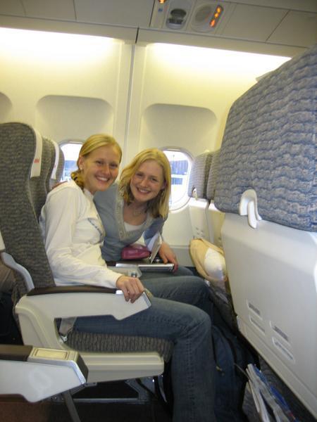 My twin (Sarah) and I on the plane