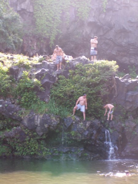people jumpin off the waterfall