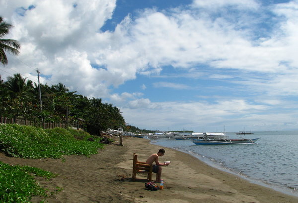 Marc reading on Donsol Beach, Southern Luzon