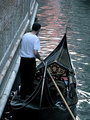 Gondolier navigating a canal