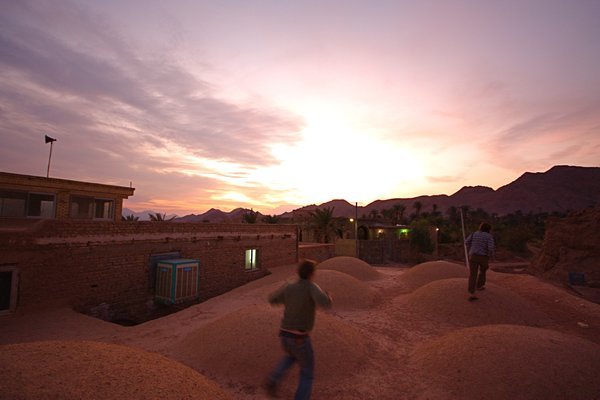 Playing on the Rooftops, Garmeh Desert Oasis