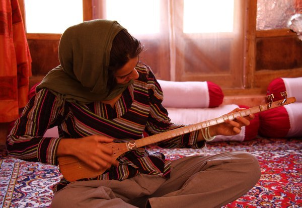 Sandra (a Swiss Iranian friend) playing a traditional Iranian instrument