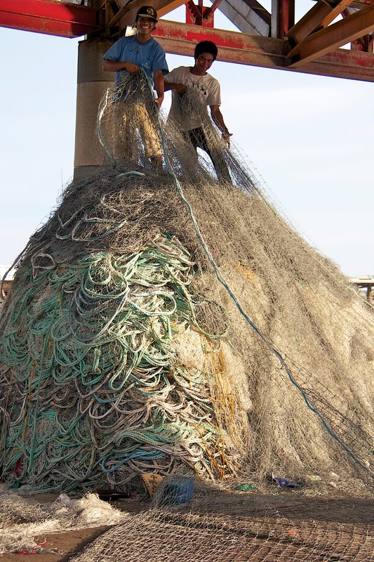 Piling Fishing Nets, Magong Harbour