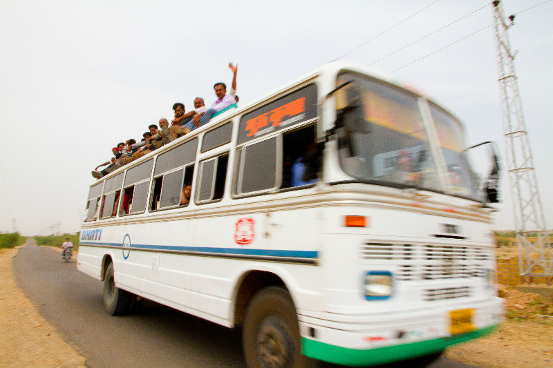 Bus with passengers on the top