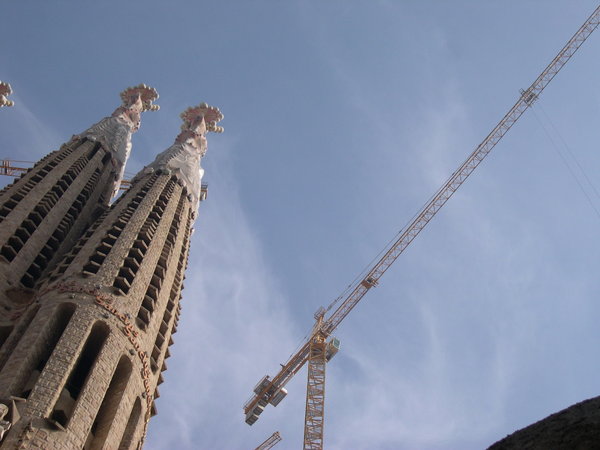Spires of Sagrada Familia and Crane