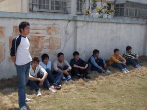 Boys from my 2nd year English class prepare to cheer their team in a basketball game.