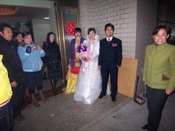 We are greeted by the bride and groom at the entrance ... 