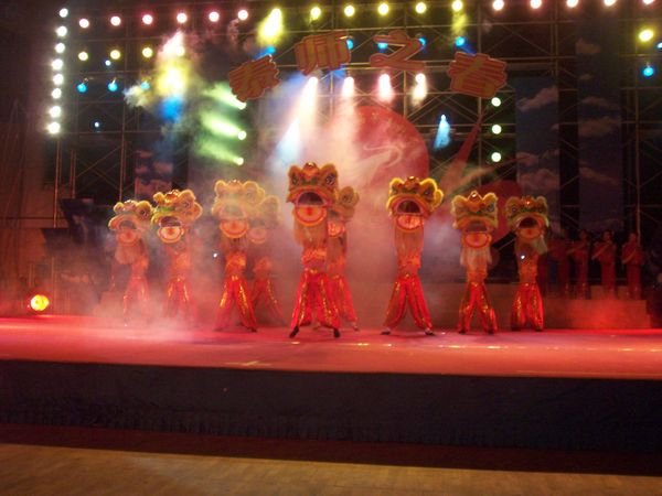 The Lions Dance is presented on stage.