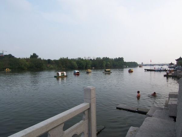 Calm waters invite paddle boats on a lazy Sunday afternoon in Taizhou.