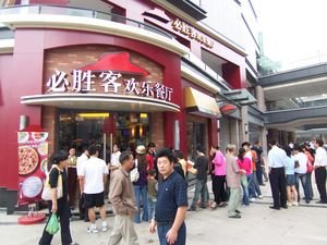 Standing in line for a 94-Yuan ($14) Pizza